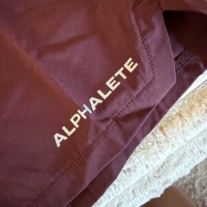 Alphalete Maroon Performance Shorts with White Logo